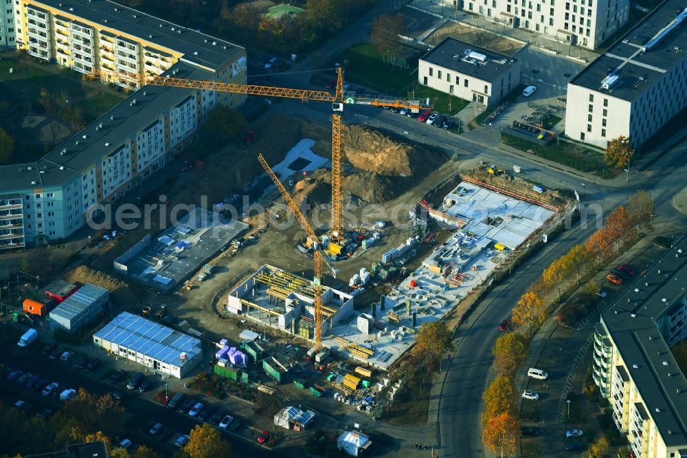 Aerial photograph Berlin - Construction site for the new residential and commercial building on the Albert-Kuntz-Strasse corner Louis-Lewin-Strasse - Adele-Sandrock-Strasse in the district Hellersdorf in Berlin, Germany