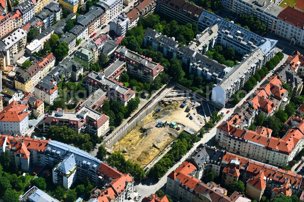 München from the bird's eye view: Construction site for the new residential and commercial building with condominiums from the ALRAM 14 project on Alramstrasse in the district Sendling in Munich in the state Bavaria, Germany