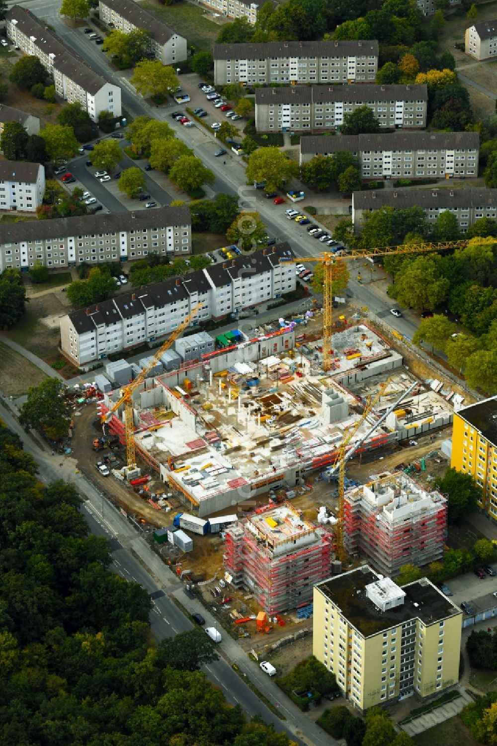 Wolfsburg from above - Construction site for the new residential and commercial building on the Breslauer Strasse - Schlesierweg in Wolfsburg in the state Lower Saxony, Germany