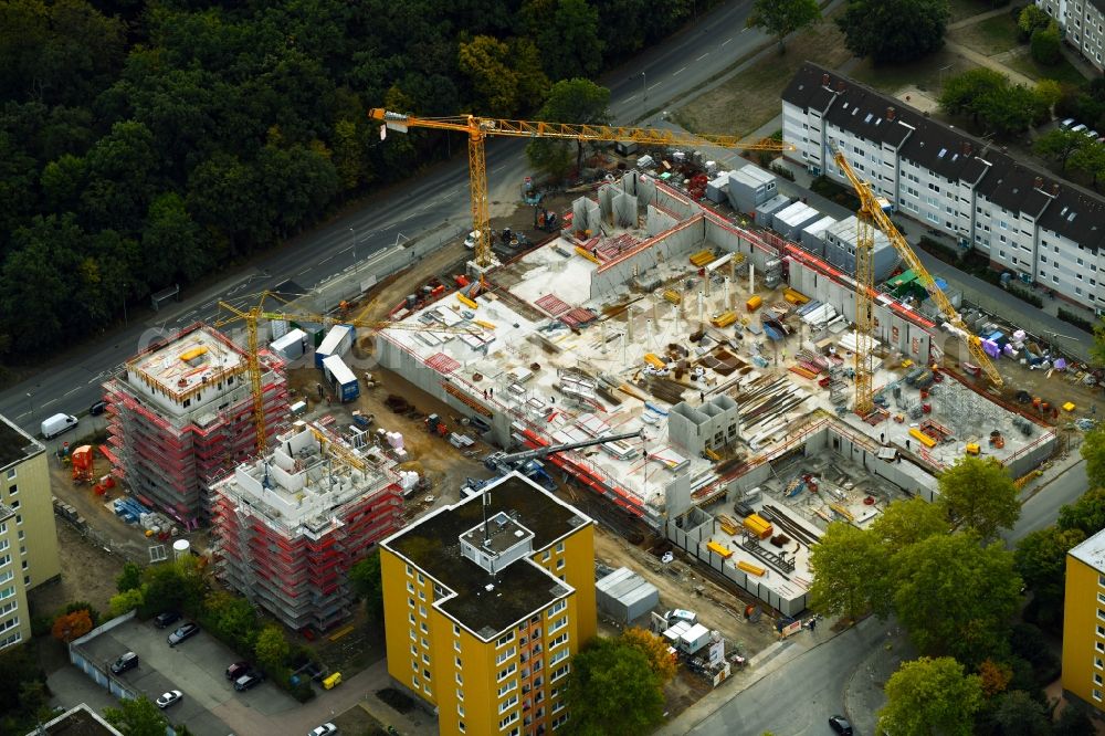 Wolfsburg from the bird's eye view: Construction site for the new residential and commercial building on the Breslauer Strasse - Schlesierweg in Wolfsburg in the state Lower Saxony, Germany