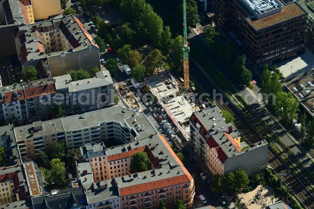 Berlin from the bird's eye view: Construction site for the new residential and commercial building on Ebersstrasse in the district Schoeneberg in Berlin, Germany