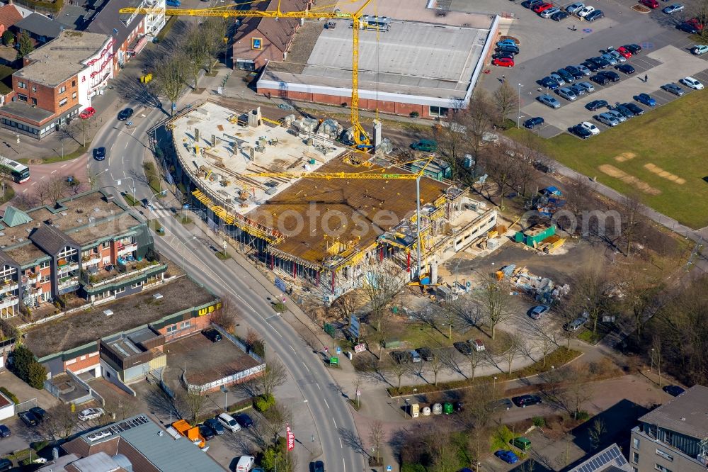 Aerial photograph Bottrop - Construction site to build a new residential and commercial building Hauptstrasse / Schulze-Delitzsch-Strasse in Bottrop in North Rhine-Westphalia. Developers is the housing Overhagen