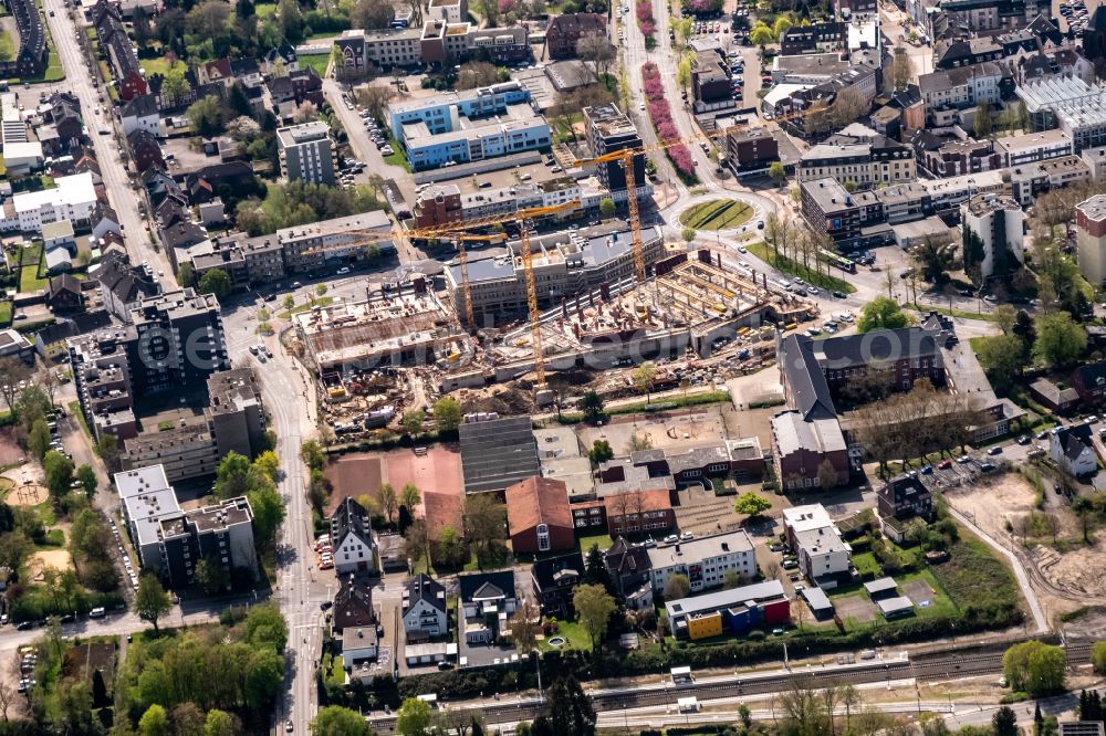 Herten from the bird's eye view: Construction site for the new residential and commercial building Hertener Hoefe on street Kaiserstrasse in Herten at Ruhrgebiet in the state North Rhine-Westphalia, Germany