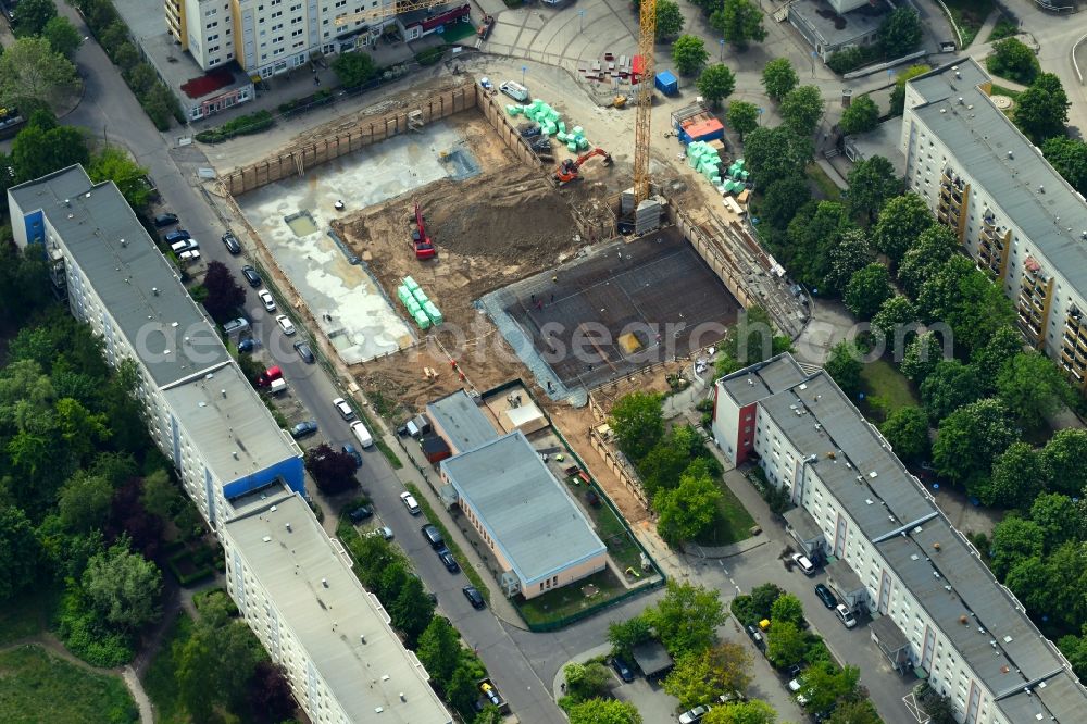 Berlin from above - Construction site for the new residential and commercial building on Kastanienboulevard - Auerbacher Ring - Schneeberger Strasse in the district Hellersdorf in Berlin, Germany