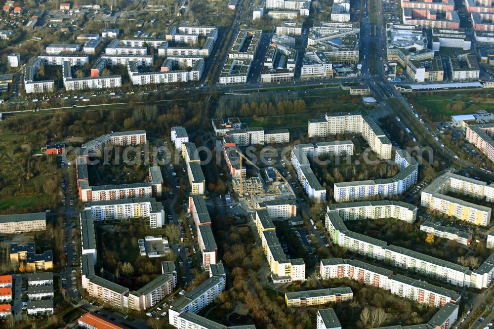 Berlin from the bird's eye view: Construction site for the new residential and commercial building on Kastanienboulevard - Auerbacher Ring - Schneeberger Strasse in the district Hellersdorf in Berlin, Germany