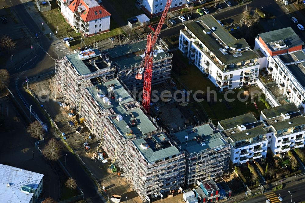 Falkensee from the bird's eye view: Construction site for the new residential and commercial building An of Lake in Falkensee in the state Brandenburg, Germany