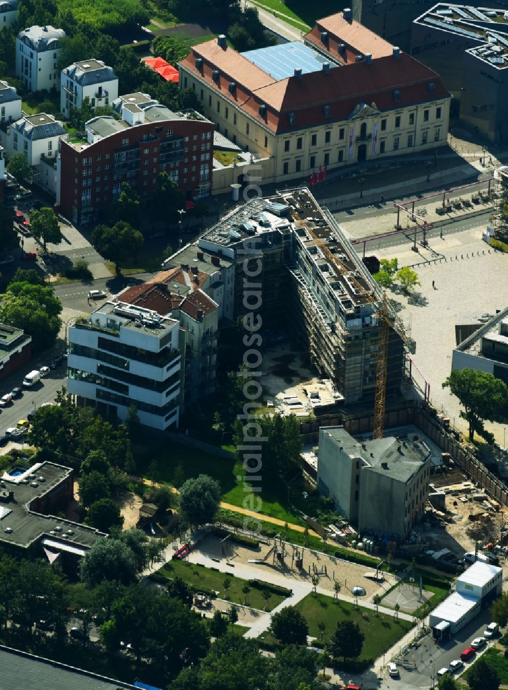 Aerial photograph Berlin - Construction site for the new residential and commercial building on the Markgrafenstrasse corner Lindenstrasse in the district Kreuzberg in Berlin, Germany