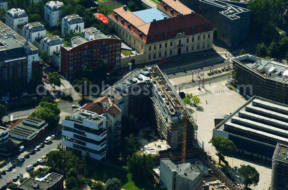 Berlin from above - Construction site for the new residential and commercial building on the Markgrafenstrasse corner Lindenstrasse in the district Kreuzberg in Berlin, Germany