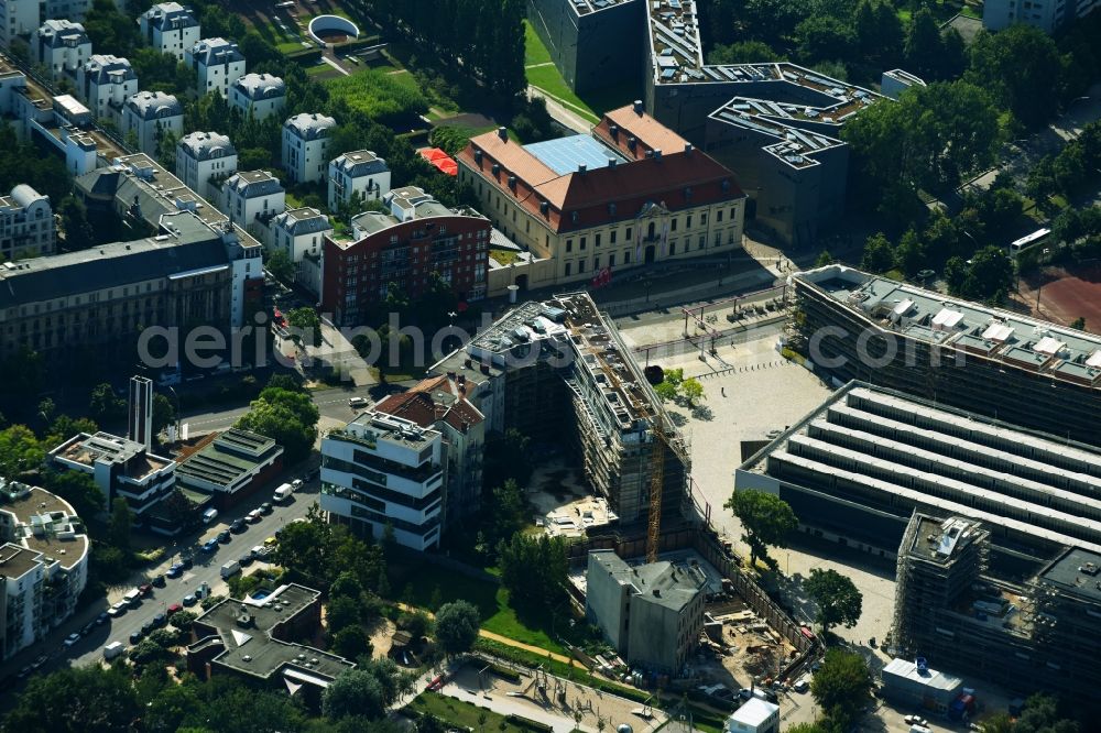 Berlin from the bird's eye view: Construction site for the new residential and commercial building on the Markgrafenstrasse corner Lindenstrasse in the district Kreuzberg in Berlin, Germany