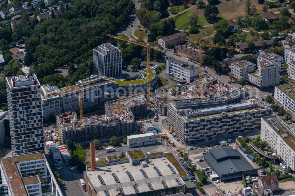 Stuttgart from the bird's eye view: Construction site for the new residential and commercial building MAYLIVING + MAYOFFICE on Maybachstrasse in the district Bahnhof Feuerbach in Stuttgart in the state Baden-Wurttemberg, Germany