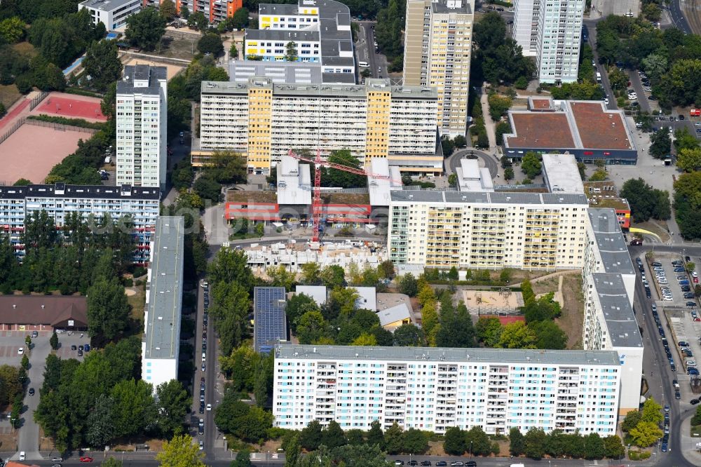 Aerial photograph Berlin - Construction site for the new residential and commercial building on the Otto-Schmirgal-Strasse corner Erieseering in the district Lichtenberg in Berlin, Germany