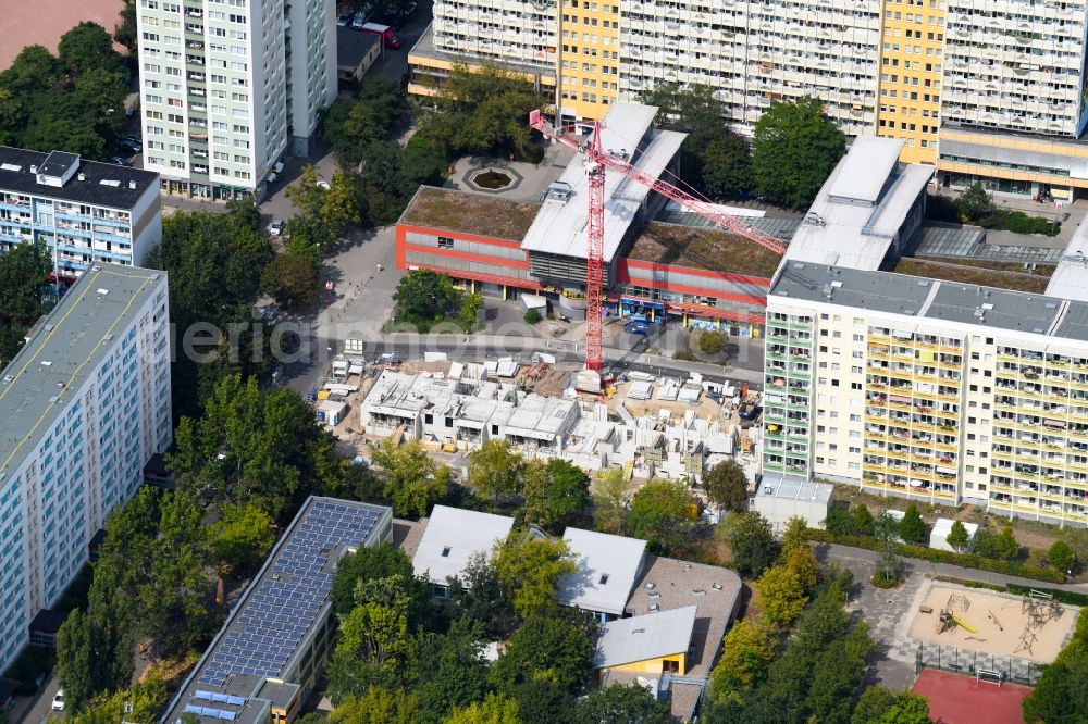 Berlin from the bird's eye view: Construction site for the new residential and commercial building on the Otto-Schmirgal-Strasse corner Erieseering in the district Lichtenberg in Berlin, Germany