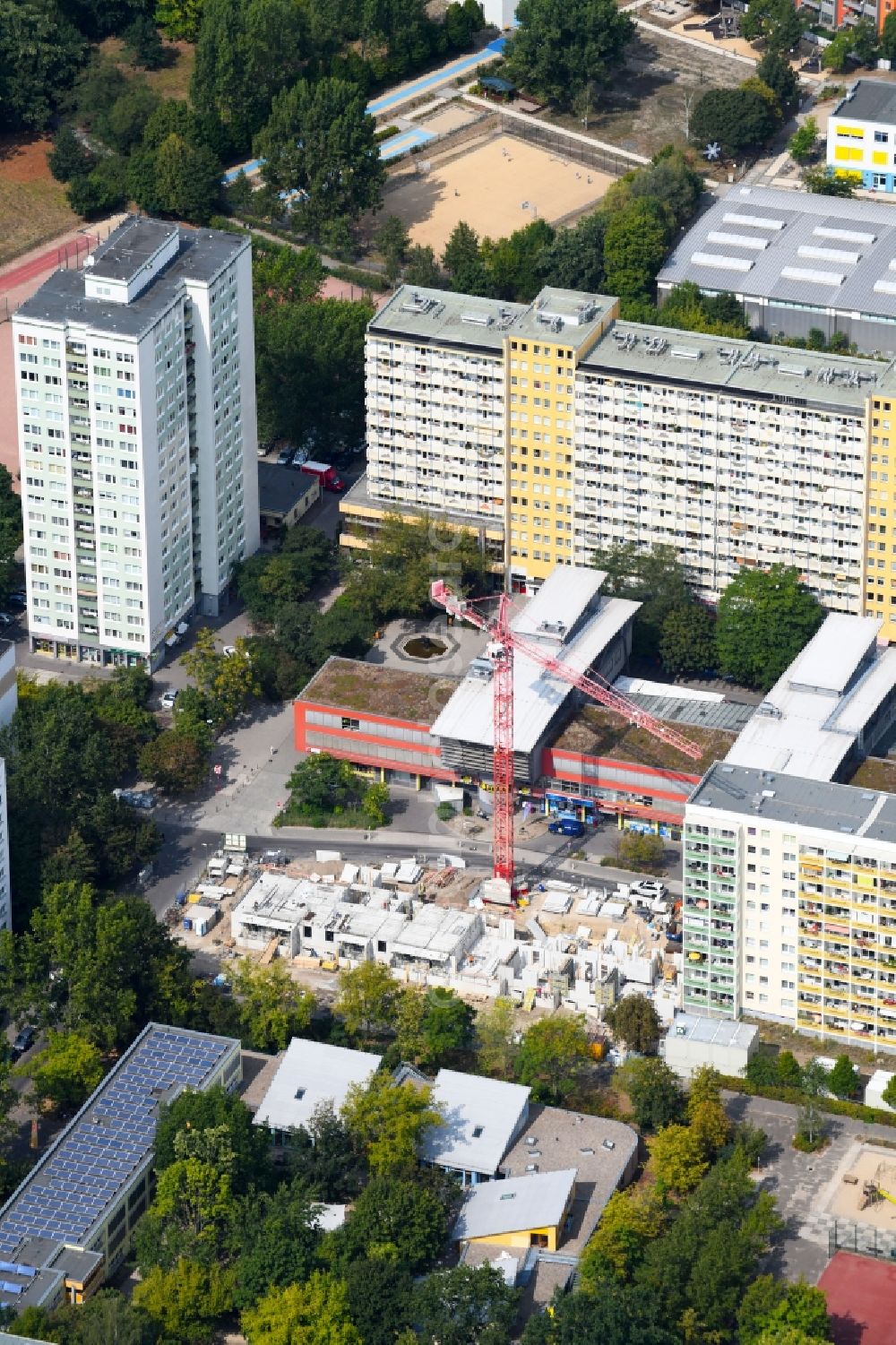 Aerial image Berlin - Construction site for the new residential and commercial building on the Otto-Schmirgal-Strasse corner Erieseering in the district Lichtenberg in Berlin, Germany