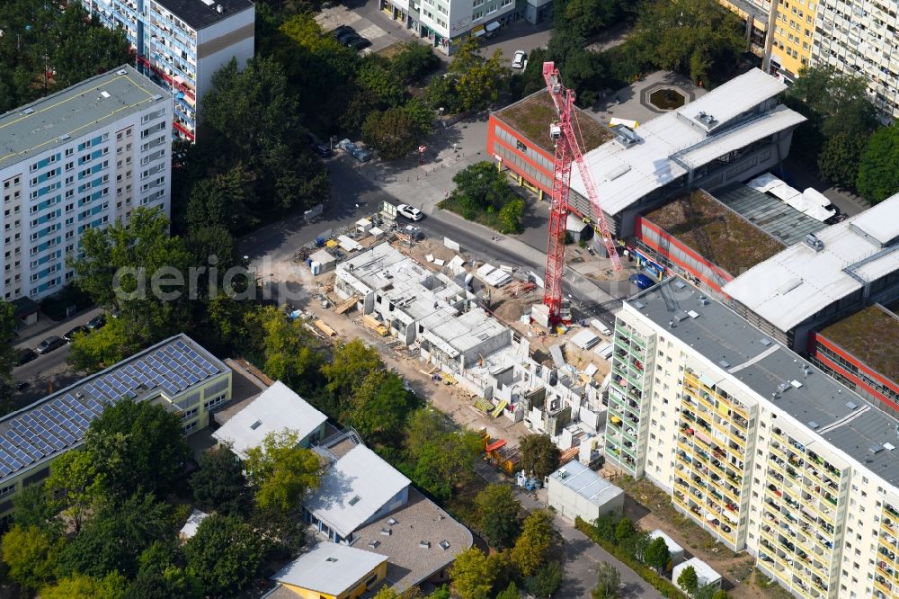 Aerial photograph Berlin - Construction site for the new residential and commercial building on the Otto-Schmirgal-Strasse corner Erieseering in the district Lichtenberg in Berlin, Germany