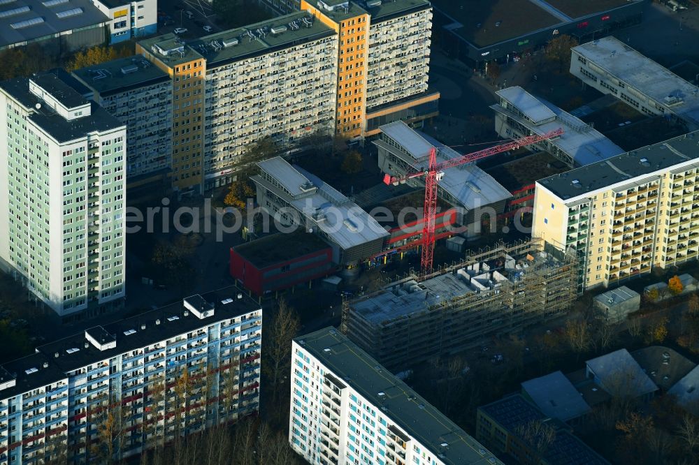 Aerial photograph Berlin - Construction site for the new residential and commercial building on the Otto-Schmirgal-Strasse corner Erieseering in the district Lichtenberg in Berlin, Germany