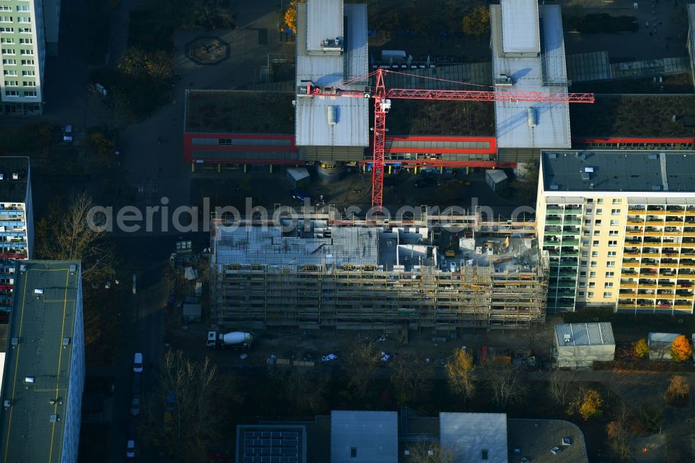 Berlin from above - Construction site for the new residential and commercial building on the Otto-Schmirgal-Strasse corner Erieseering in the district Lichtenberg in Berlin, Germany