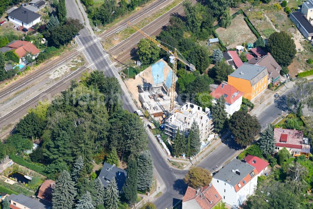 Aerial photograph Berlin - Construction site for the new residential and commercial building on the on Lemkestrasse corner Donizettistrasse in the district Mahlsdorf in Berlin, Germany