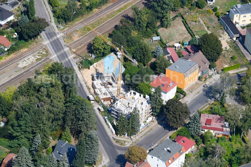 Berlin from above - Construction site for the new residential and commercial building on the on Lemkestrasse corner Donizettistrasse in the district Mahlsdorf in Berlin, Germany