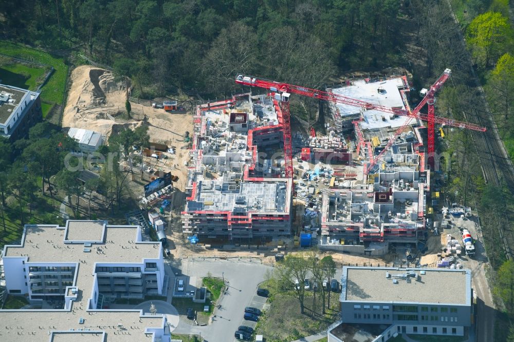 Berlin from the bird's eye view: Construction site for the new residential and commercial building on the Clayallee in the district Dahlem in Berlin, Germany