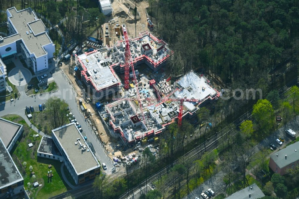 Berlin from the bird's eye view: Construction site for the new residential and commercial building on the Clayallee in the district Dahlem in Berlin, Germany