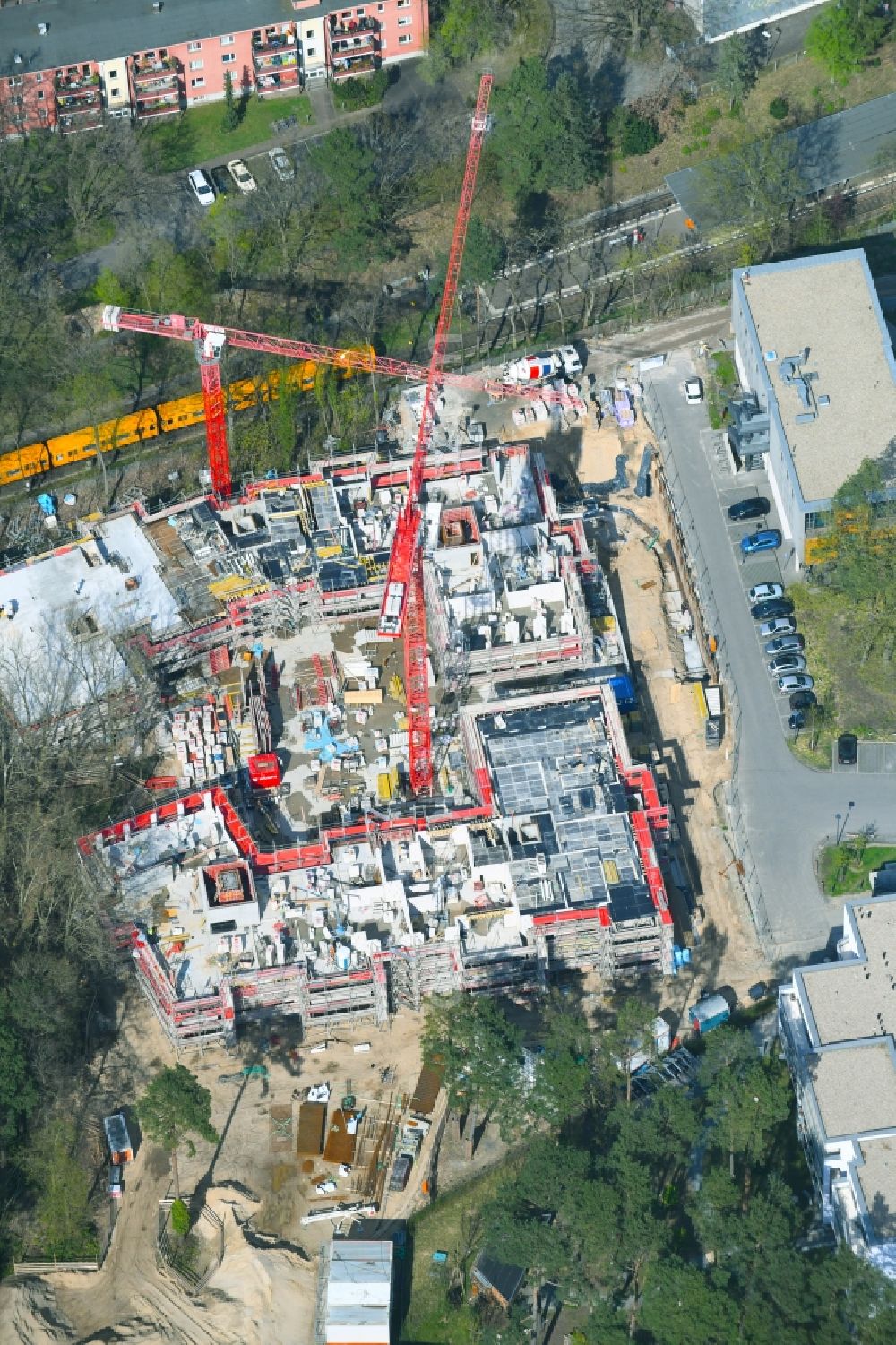 Berlin from the bird's eye view: Construction site for the new residential and commercial building on the Clayallee in the district Dahlem in Berlin, Germany