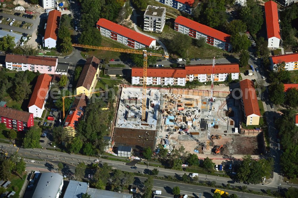 Erlangen from the bird's eye view: Construction site for the new residential and commercial building Paul-Carre on Paul-Gossen-Strasse in Erlangen in the state Bavaria, Germany