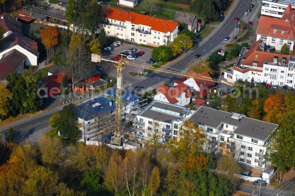 Wandlitz from the bird's eye view: Construction site for the new residential and commercial building on the Prenzlauer Chaussee - Lanker Weg in Wandlitz in the state Brandenburg, Germany