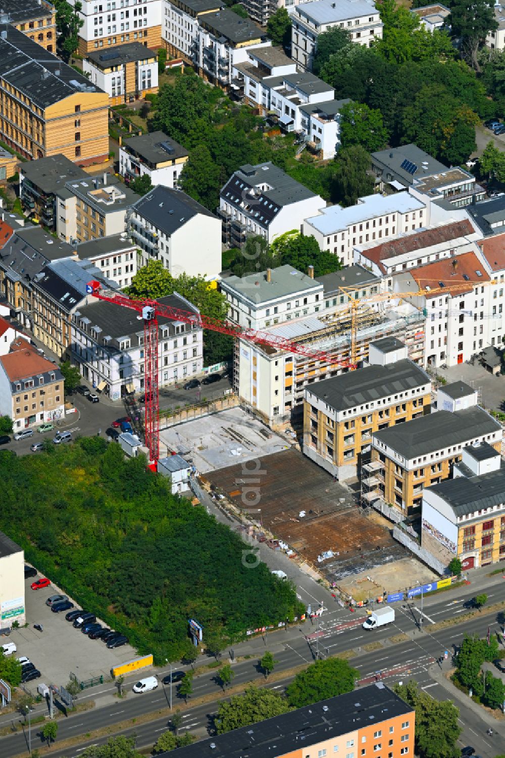 Leipzig from the bird's eye view: Construction site for the new residential and commercial building Quartiers Kreuzstrasse in the district Zentrum in Leipzig in the state Saxony, Germany