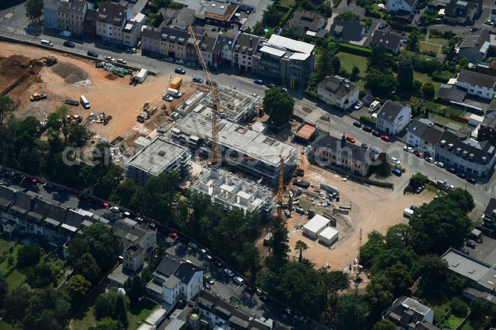 Bonn from the bird's eye view: Construction site for the new residential and commercial building on Schumanns Hoehe along the Sebastianstrasse in the district Endenich in Bonn in the state North Rhine-Westphalia, Germany