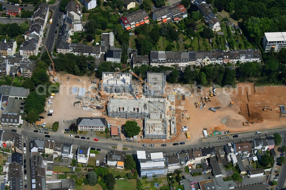 Bonn from the bird's eye view: Construction site for the new residential and commercial building on Schumanns Hoehe along the Sebastianstrasse in the district Endenich in Bonn in the state North Rhine-Westphalia, Germany