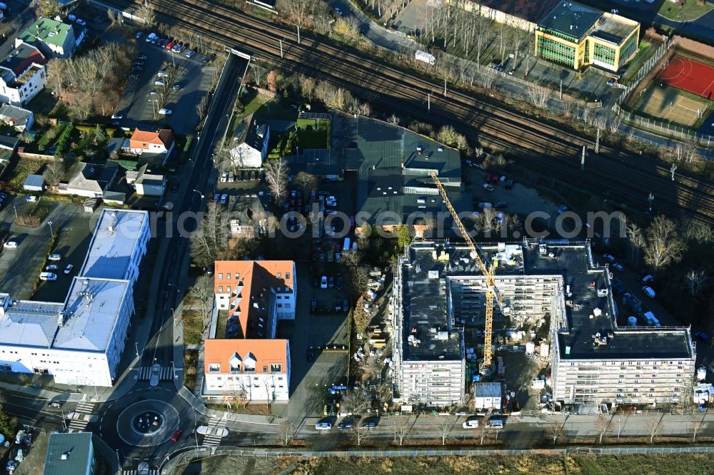 Falkensee from above - Construction site for the new residential and commercial building Schwartzkopffstrasse corner Leipziger Strasse in Falkensee in the state Brandenburg, Germany