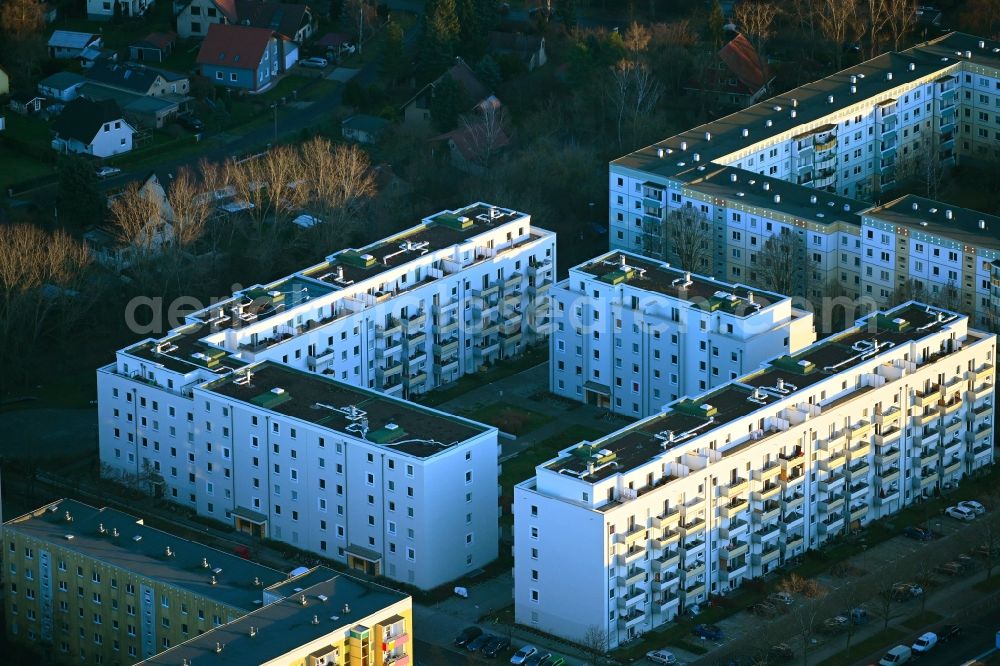 Berlin from the bird's eye view: Construction site for the new residential and commercial building on the Schwarzheider Strasse corner Louis-Lewin-Strasse - Forster Strasse in the district Hellersdorf in Berlin, Germany