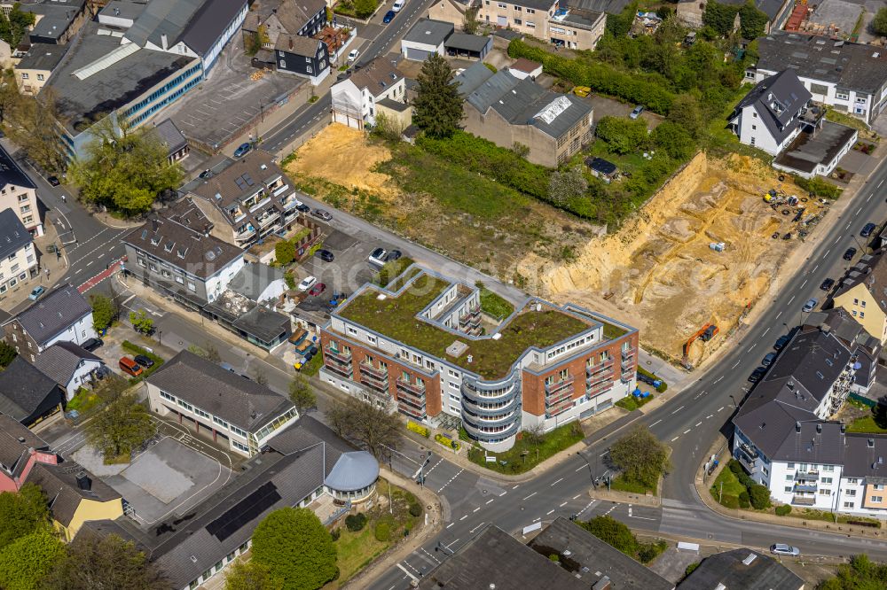 Aerial image Heiligenhaus - Construction site for the new residential and commercial building Suedringterassen on street Frankenstrasse - Hauptstrasse - Suedring in Heiligenhaus at Ruhrgebiet in the state North Rhine-Westphalia, Germany