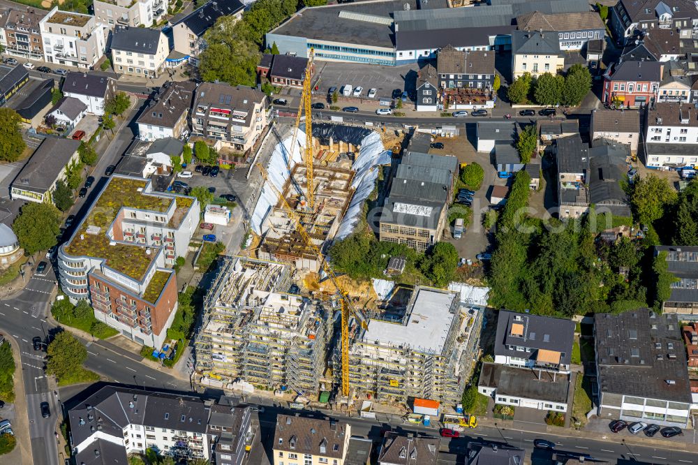 Heiligenhaus from above - Construction site for the new residential and commercial building Suedringterassen on street Frankenstrasse - Hauptstrasse - Suedring in Heiligenhaus at Ruhrgebiet in the state North Rhine-Westphalia, Germany