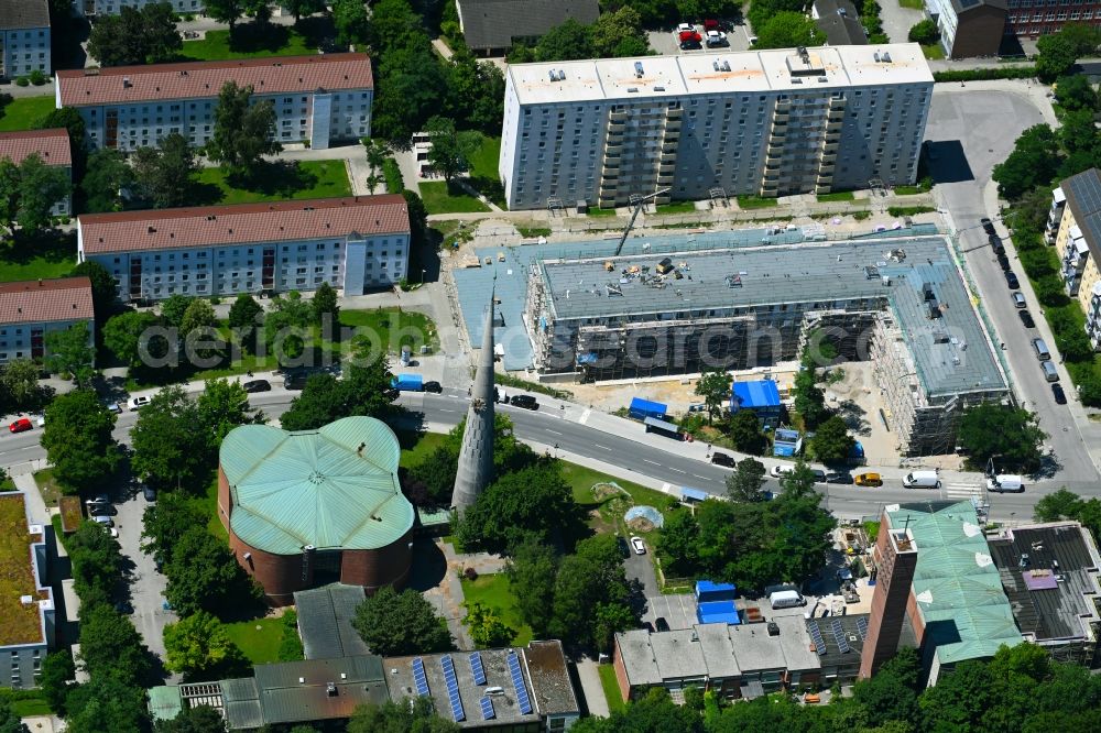 München from above - Construction site for the new residential and commercial building am Stanigplatz in front of church St. Nikolaus in the district Hasenbergl in Munich in the state Bavaria, Germany