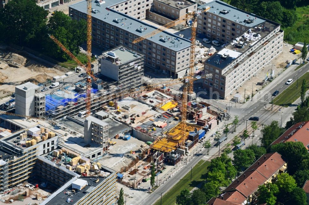 München from the bird's eye view: Construction site for the new residential and commercial building of WOGENO Muenchen eG on Eugen-Jochum-Strasse in the district Bogenhausen in Munich in the state Bavaria, Germany