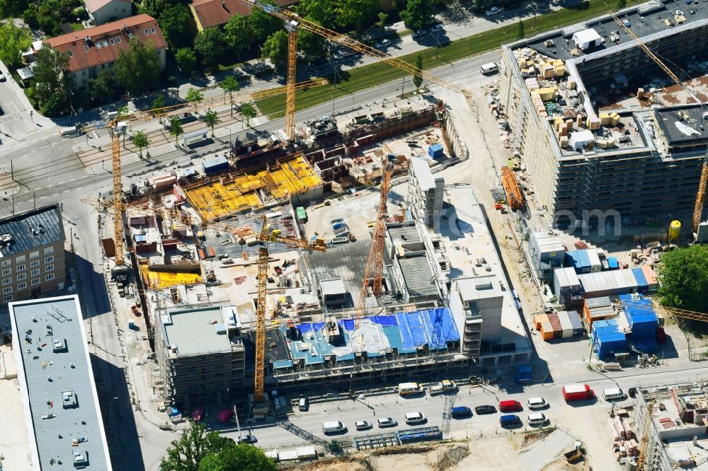 München from above - Construction site for the new residential and commercial building of WOGENO Muenchen eG on Eugen-Jochum-Strasse in the district Bogenhausen in Munich in the state Bavaria, Germany