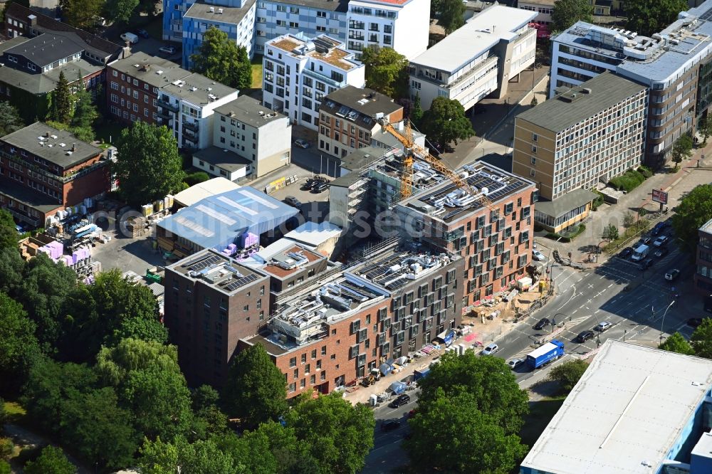 Hamburg from above - Construction site for the new residential and commercial building Wohn- and Geschaeftshaus in Wandsbek on Wandsbeker Allee - Kattunbleiche in the district Wandsbek in Hamburg, Germany