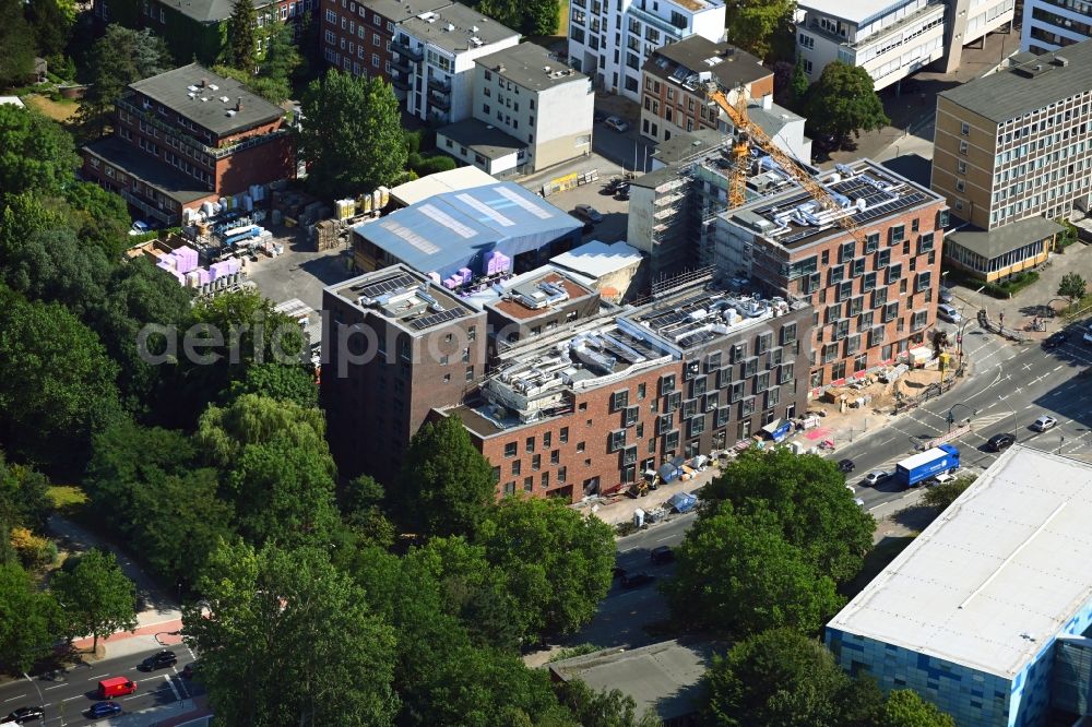 Hamburg from the bird's eye view: Construction site for the new residential and commercial building Wohn- and Geschaeftshaus in Wandsbek on Wandsbeker Allee - Kattunbleiche in the district Wandsbek in Hamburg, Germany