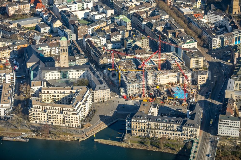 Mülheim an der Ruhr from the bird's eye view: Construction site for the new building eines Wohn- and Geschaeftshausviertels on Schlossstrasse - Schollenstrasse - Friedrich-Ebert-Allee in Muelheim on the Ruhr in the state North Rhine-Westphalia