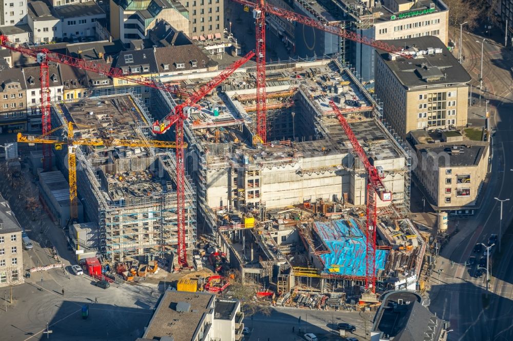 Aerial photograph Mülheim an der Ruhr - Construction site for the new building eines Wohn- and Geschaeftshausviertels on Schlossstrasse - Schollenstrasse - Friedrich-Ebert-Allee in Muelheim on the Ruhr in the state North Rhine-Westphalia