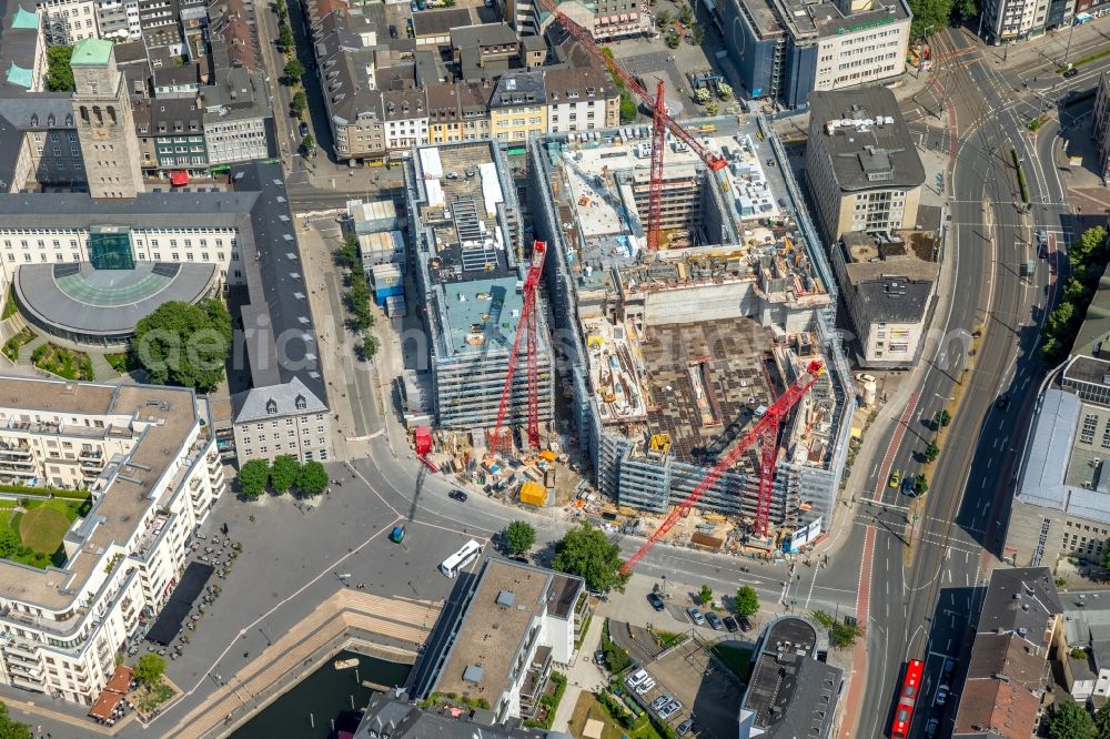 Aerial image Mülheim an der Ruhr - Construction site for the new building eines Wohn- and Geschaeftshausviertels on Schlossstrasse - Schollenstrasse - Friedrich-Ebert-Allee in Muelheim on the Ruhr in the state North Rhine-Westphalia