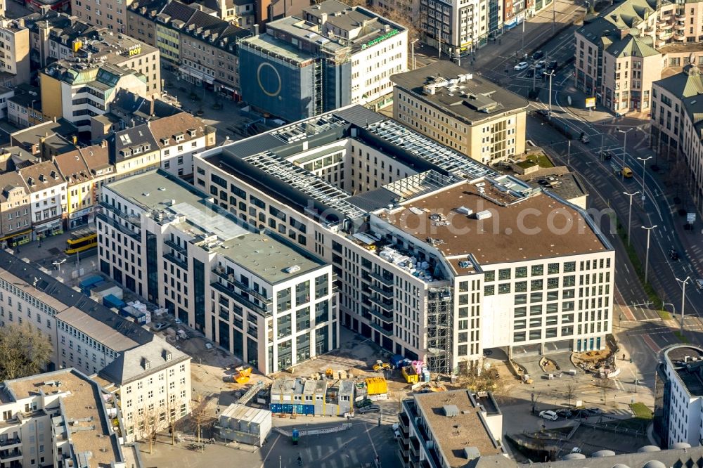 Mülheim an der Ruhr from the bird's eye view: Construction site for the new building eines Wohn- and Geschaeftshausviertels on Schlossstrasse - Schollenstrasse - Friedrich-Ebert-Allee in Muelheim on the Ruhr in the state North Rhine-Westphalia