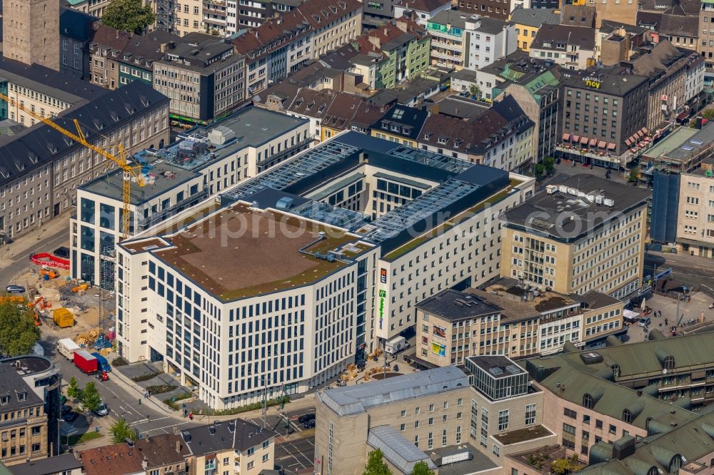 Aerial image Mülheim an der Ruhr - Construction site for the new building eines Wohn- and Geschaeftshausviertels on Schlossstrasse - Schollenstrasse - Friedrich-Ebert-Allee in Muelheim on the Ruhr in the state North Rhine-Westphalia