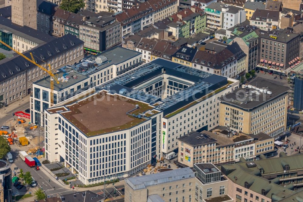 Aerial photograph Mülheim an der Ruhr - Construction site for the new building eines Wohn- and Geschaeftshausviertels on Schlossstrasse - Schollenstrasse - Friedrich-Ebert-Allee in Muelheim on the Ruhr in the state North Rhine-Westphalia