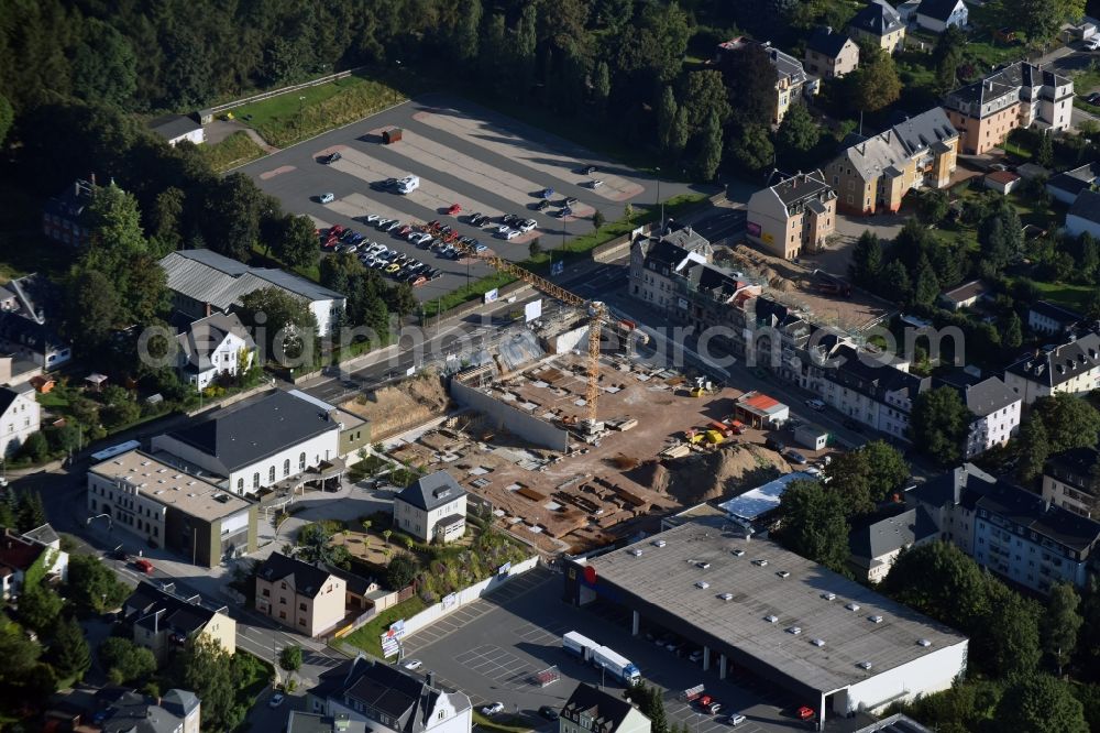 Aerial photograph Stollberg/Erzgeb. - Construction site of the ATS GmbH Chemnitz for the new building of a residential - and business area in the Schiller Street in Stollberg/Erzgeb. in the state Saxony