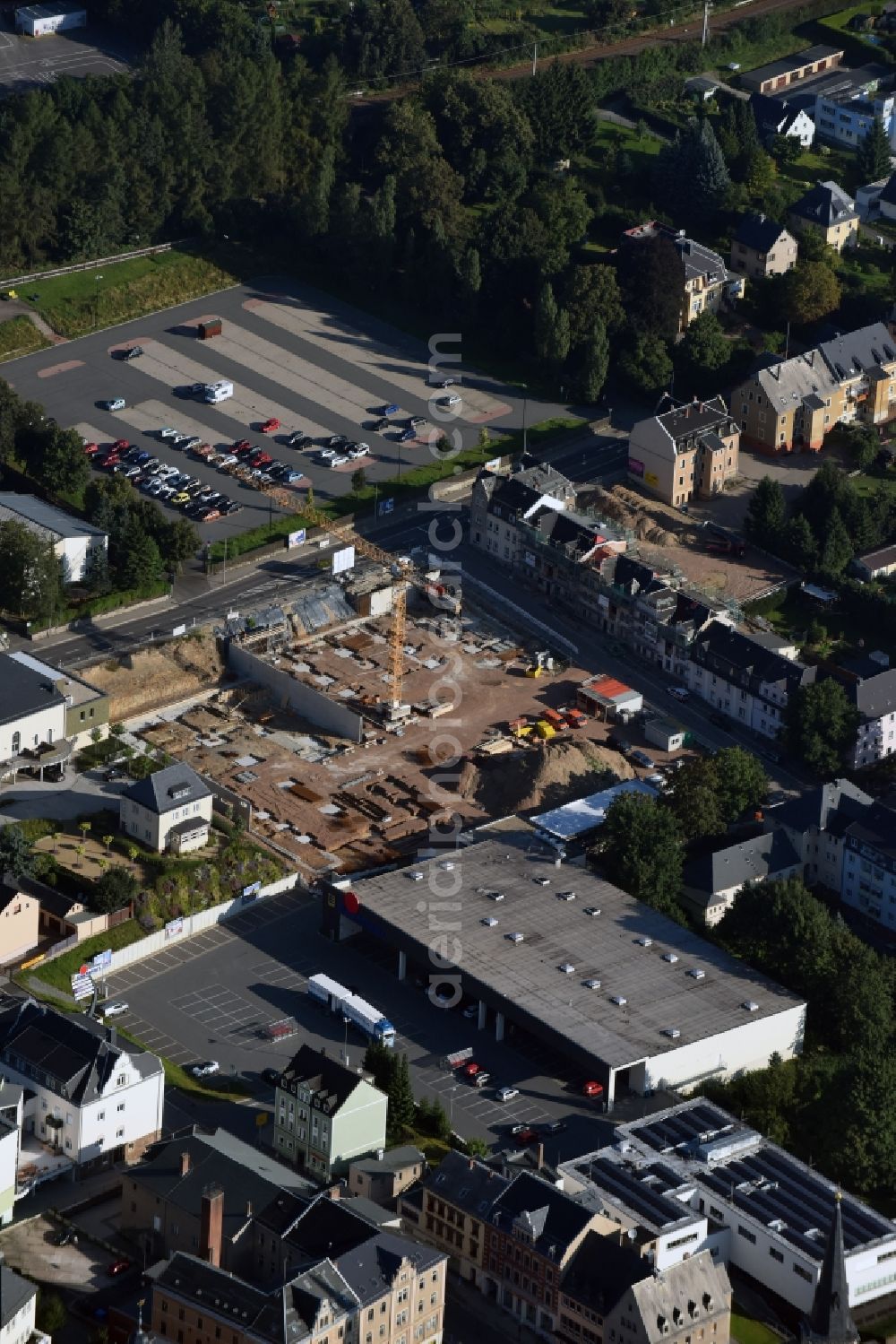 Stollberg/Erzgeb. from above - Construction site of the ATS GmbH Chemnitz for the new building of a residential - and business area in the Schiller Street in Stollberg/Erzgeb. in the state Saxony