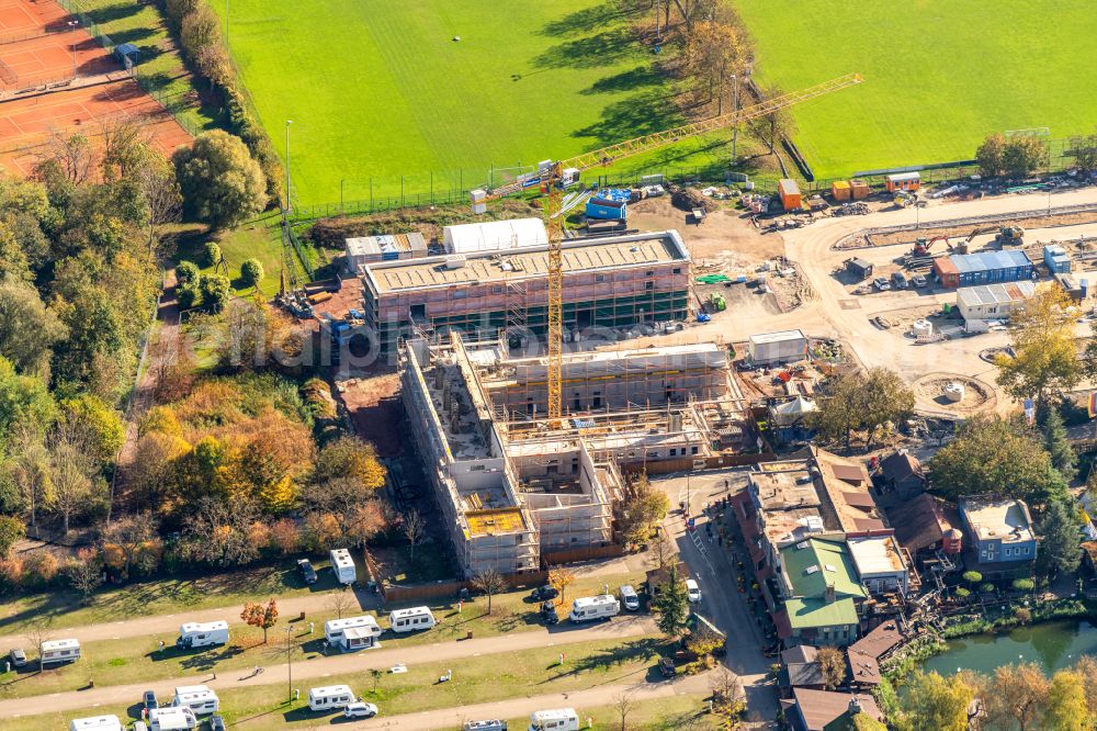 Aerial photograph Rust - Construction site for the new building residential and administrative buildings on street Rheinweg in Rust in the state Baden-Wuerttemberg, Germany