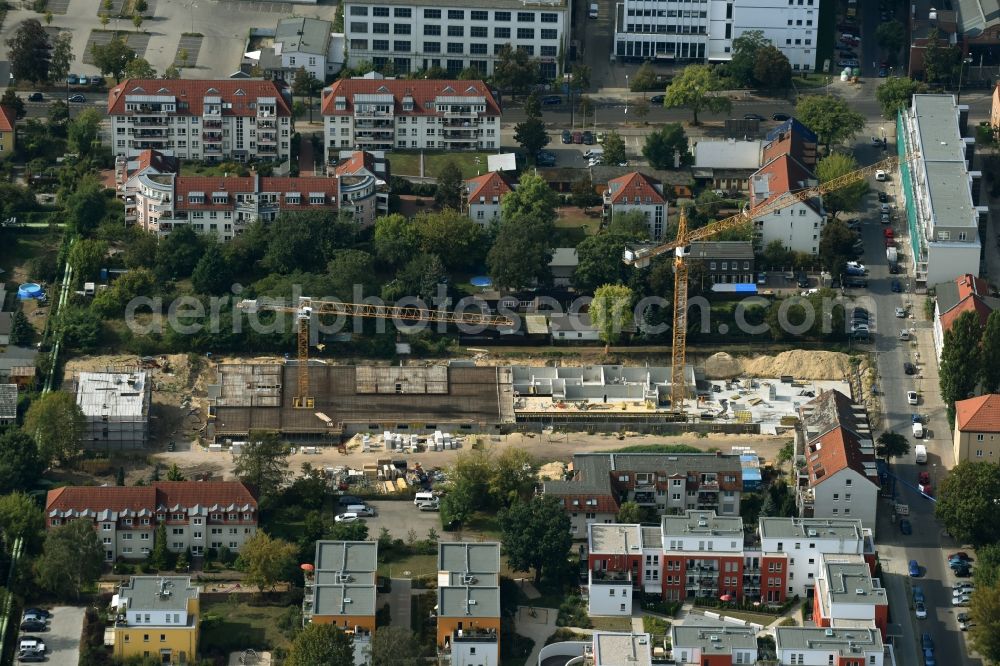 Aerial image Berlin - Construction site for the new building of a apartment house facility of the residential building cooperative WBG a??Amtsfelda?? eG in Berlin