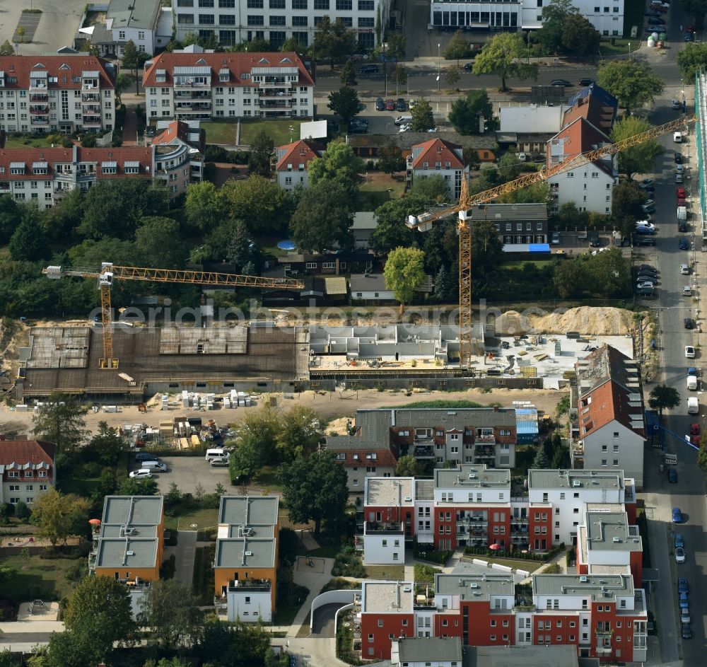 Aerial photograph Berlin - Construction site for the new building of a apartment house facility of the residential building cooperative WBG a??Amtsfelda?? eG in Berlin